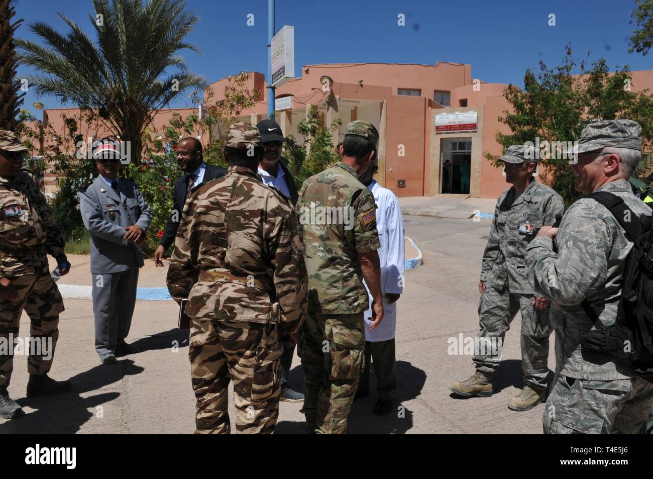 Leadership and medical personnel assigned 151st Medical Group of the Utah Air National Guard meet with the delegate of the Minister of Health of the province of Souss-Massa at the Hospital Provincial De Tata during the humanitarian civic assistance component of exercise African Lion 2019 in Tata, Morocco, March 28, 2019. African Lion 2019 is a Chairman of the Joint Chiefs of Staff-sponsored, U.S. African Command-scheduled, U.S. Marine Corps Forces Europe and Africa-led, joint and combined exercise conducted in the Kingdom of Morocco. African Lion offers an opportunity for participation in a mu Stock Photo