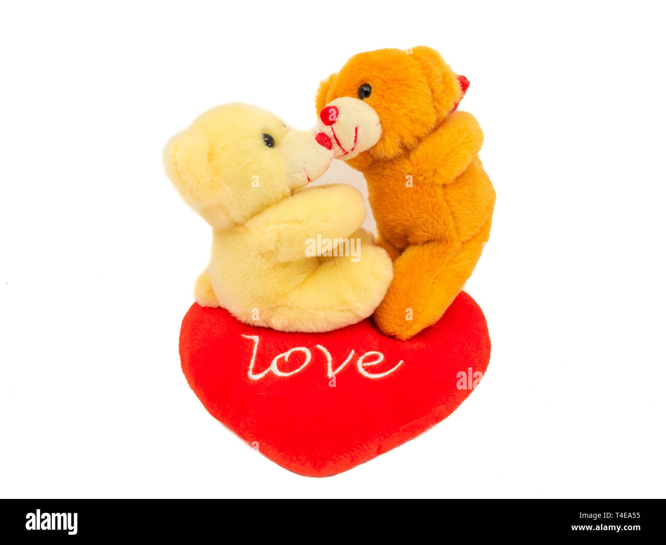 Two plush toys Teddy Bear with red heart  on white background Stock Photo