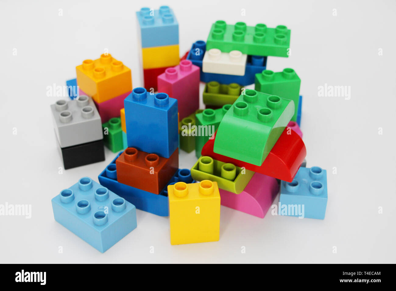 Construction designer for children. Building blocks. Multi-colored cubes for children. Teaching children. Geometry study. Stock Photo