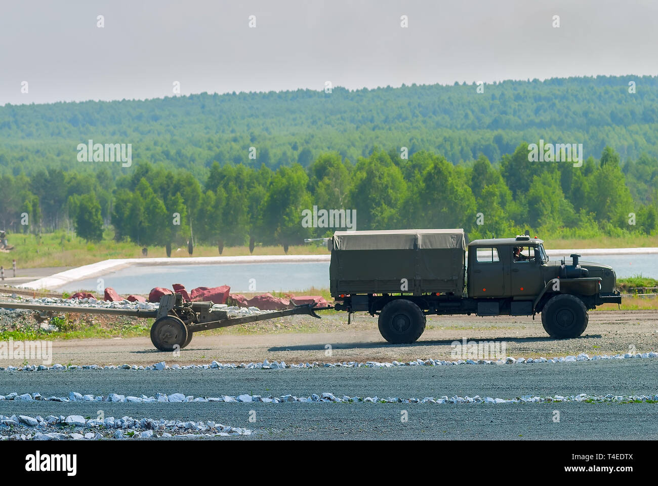 Nizhniy Tagil, Russia - July 12. 2008: army truck with cannon moving to destination point. Russia Arms Expo Stock Photo