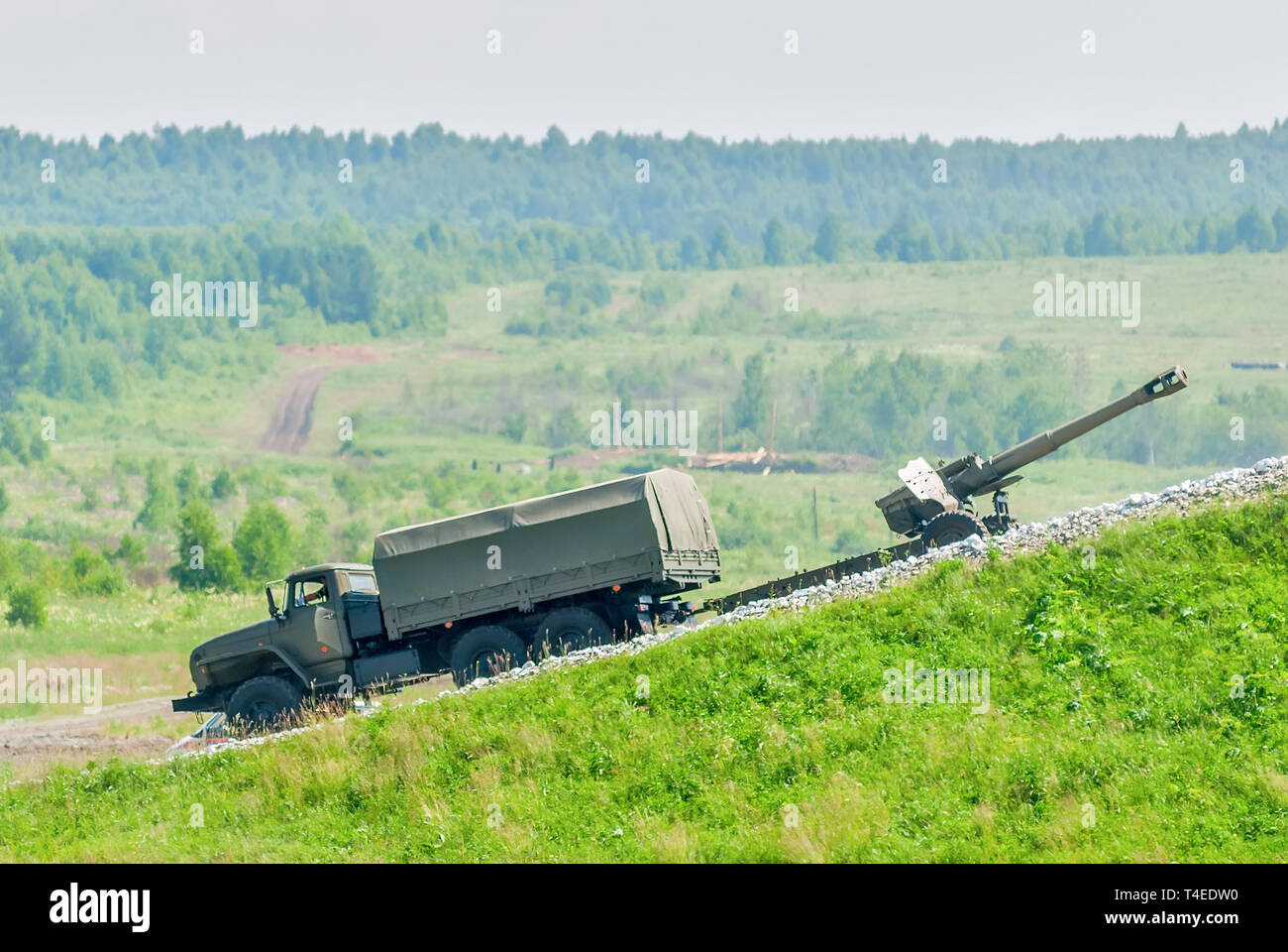 Nizhniy Tagil, Russia - July 12. 2008: army truck with cannon moving to destination point. Russia Arms Expo Stock Photo