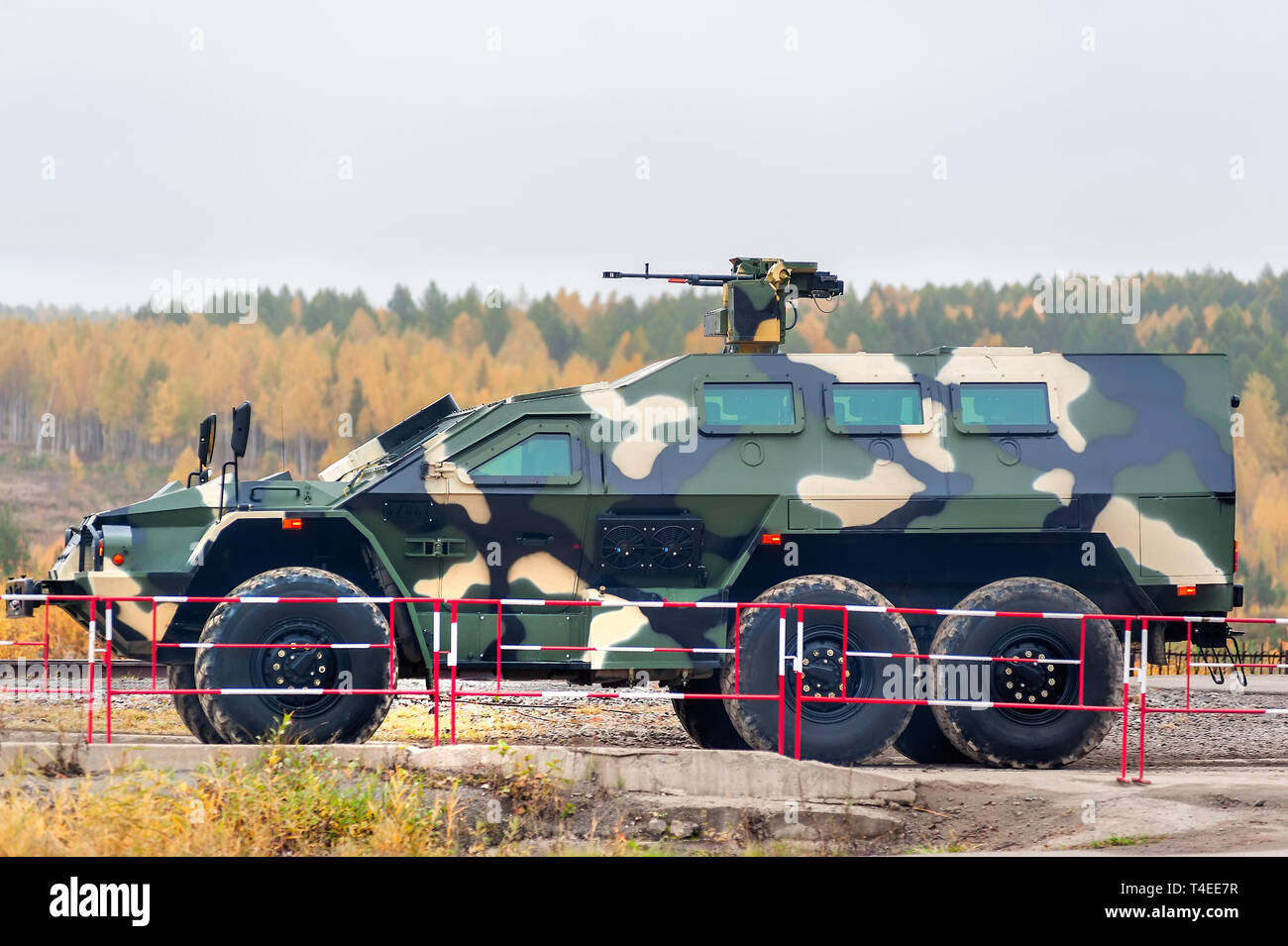 Nizhniy Tagil, Russia - September 27. 2013: SBA-60K2 Bulat armored vehicle with remote weapons turret. It move on the shooting demonstration range. Ru Stock Photo