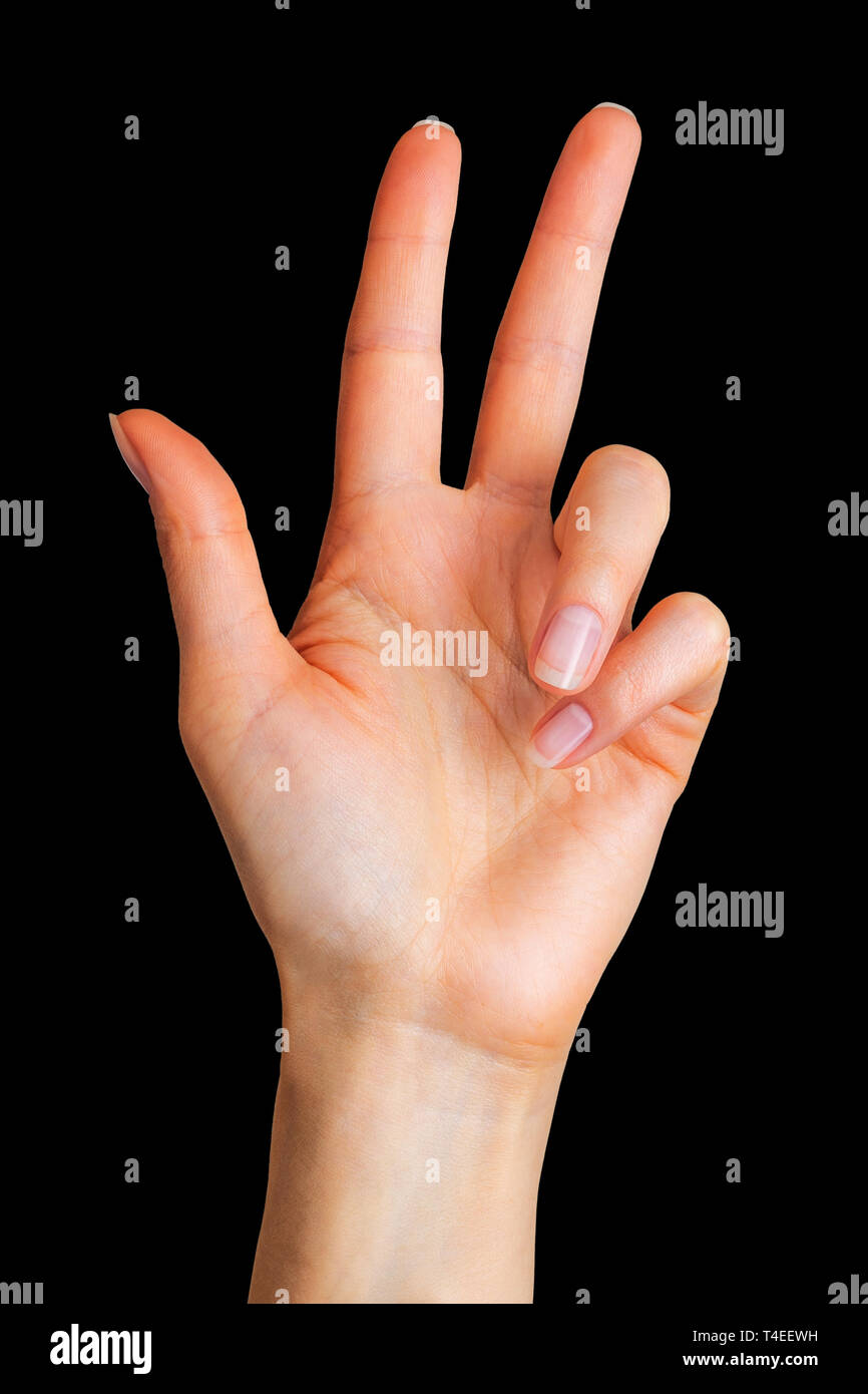 Female hand showing 3 fingers in gesture of order beer in Germany Stock