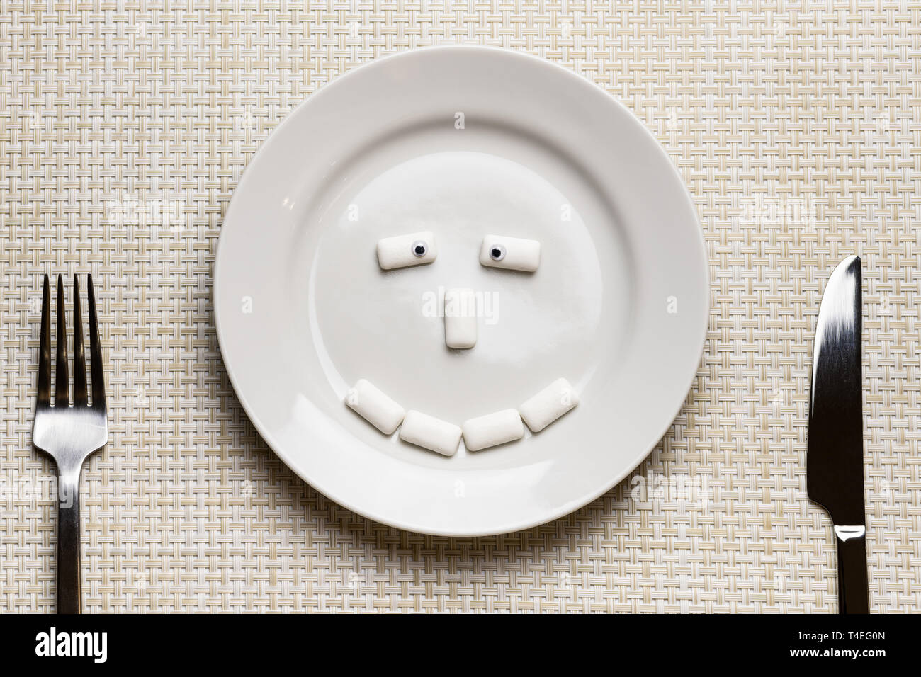 Chewing gum shaped funny face. Oral hygiene and protect teeth from