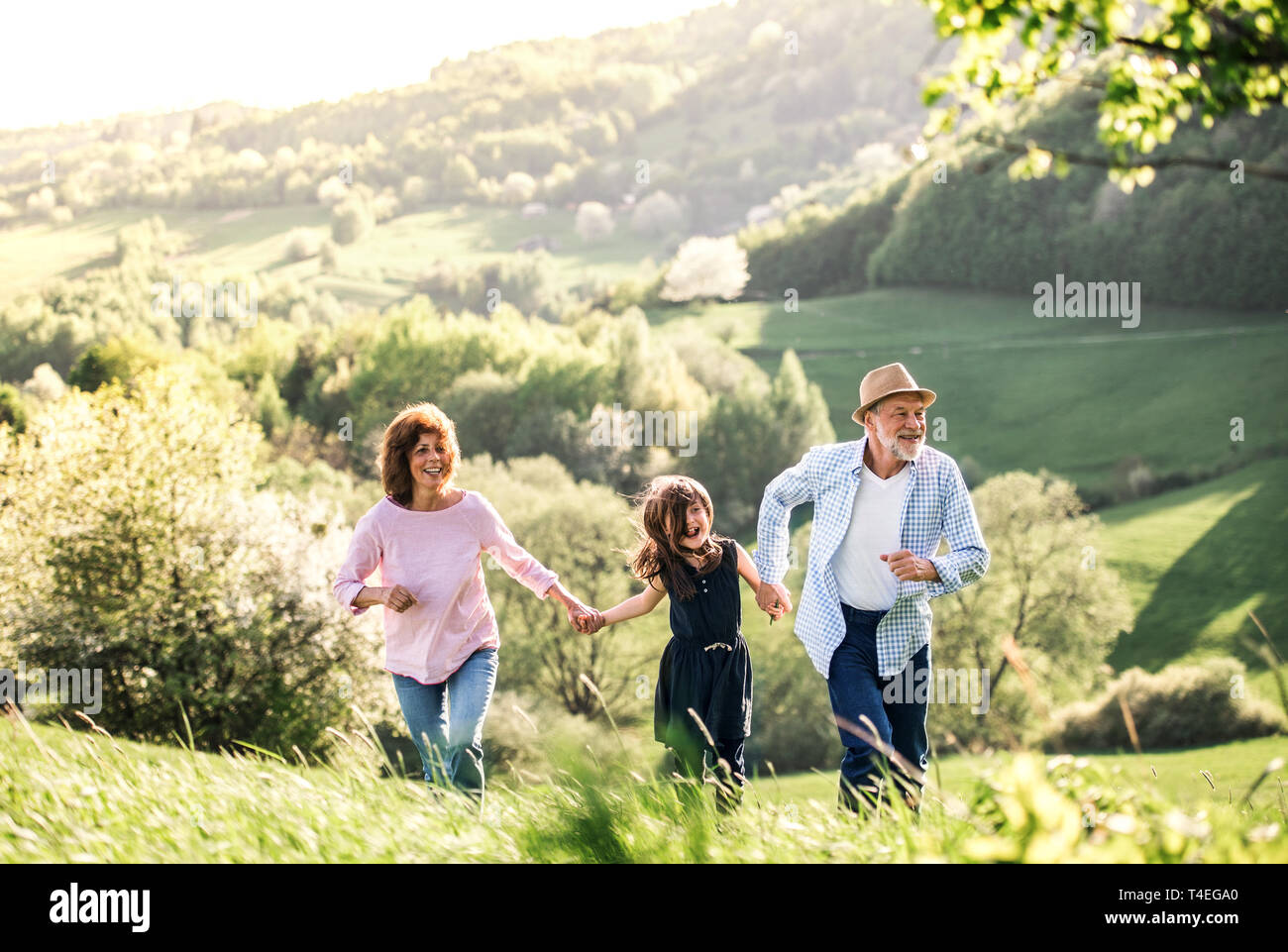 Old man walking small child hi-res stock photography and images - Alamy