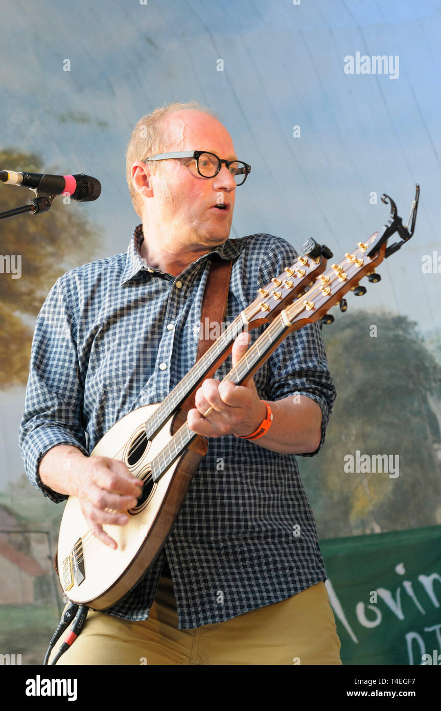 Adrian (Ade) Edmondson performing with The Bad Shepherds at the Larmer Tree Festival, UK. July 19, 2014 Stock Photo