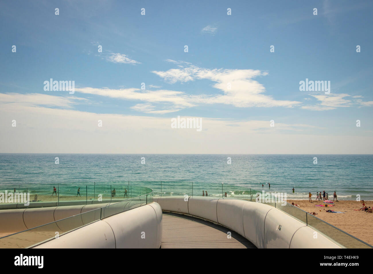 modern concrete and glass footbridge over the career de jovellanos by the sea in Alicante Spain Stock Photo