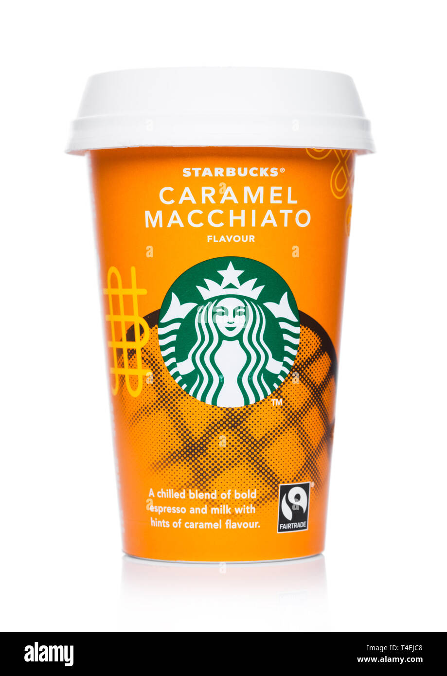 LONDON, UK - APRIL 15, 2019: Paper cup of Starbucks cold coffee with Caramel Macchiato flavour on white. Stock Photo