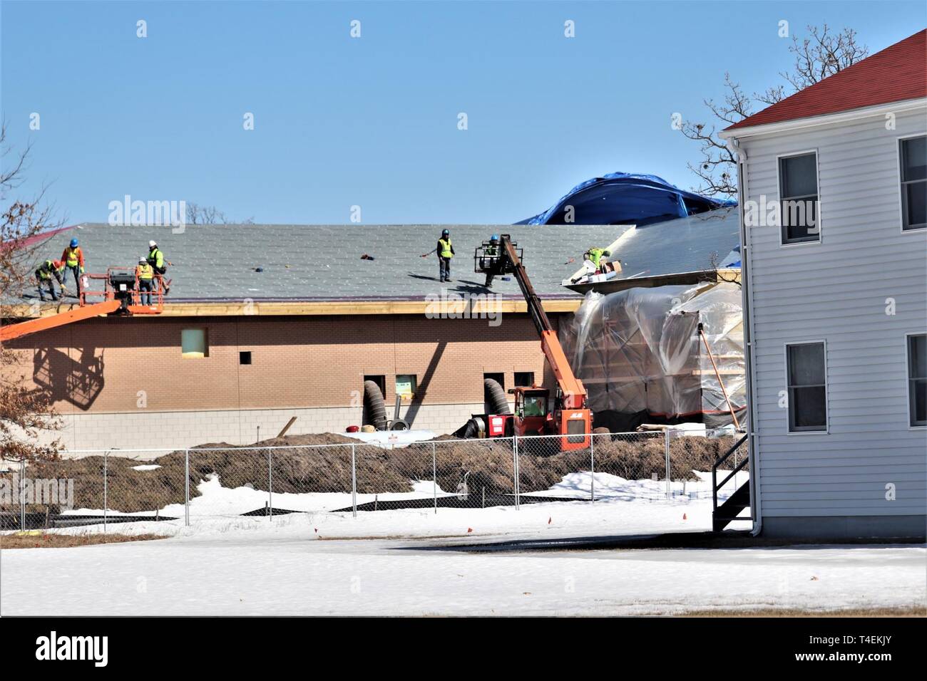 Contractors work on a new 1,428-person annual training/mobilization dining facility March 19, 2019, in the 2400 block at Fort McCoy, Wis. The project, coordinated by the U.S. Army Corps of Engineers, is being constructed by contractor L.S. Black Constructors of St. Paul, Minn., and is supposed to be completed in late 2019. Stock Photo