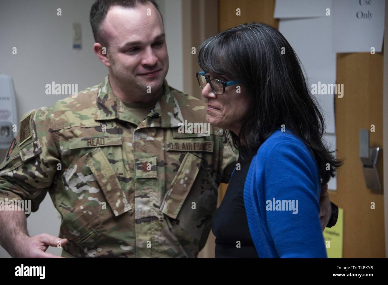 Air Force Maj. (Dr.) Matthew Read, acting Extracorporeal Membrane Oxygenation medical director, shares an emotional moment with former patient, Rita Ibanez, at Brooke Army Medical Center, Fort Sam Houston, Texas, March 22, 2019. Ibanez met with Read and other members of the ECMO team to thank them for the care she received in 2015. Stock Photo