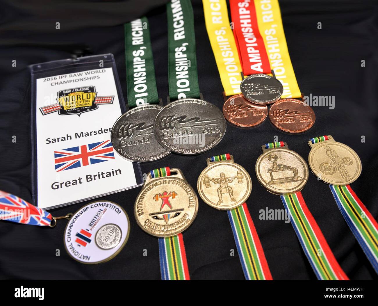 Gold, silver and bronze medals from powerlifting competitions around