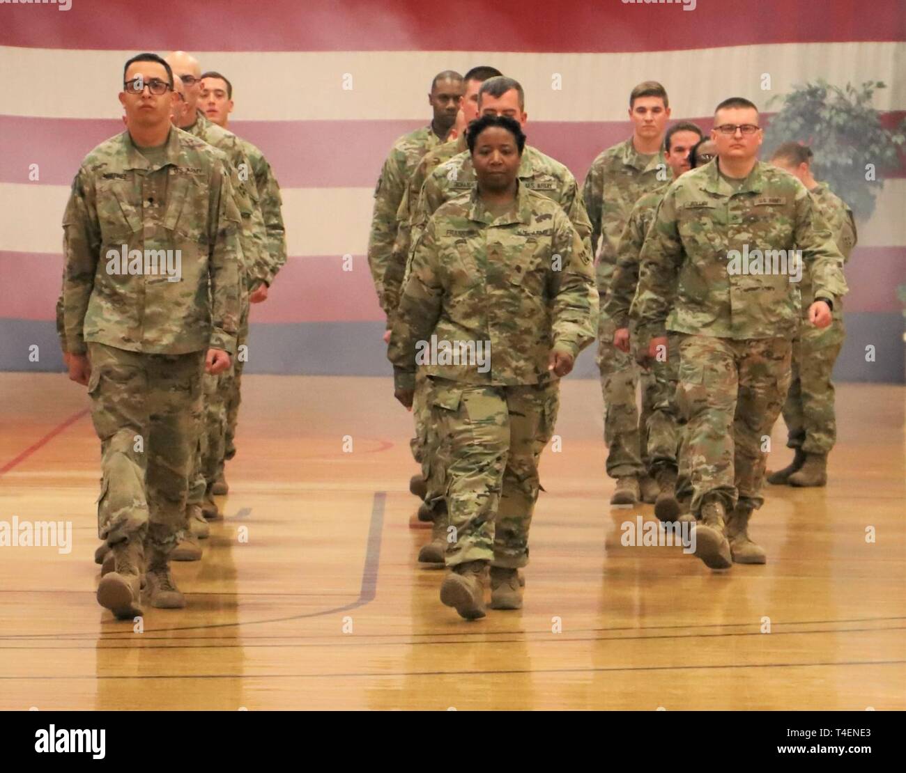 Soldiers from 4th Sustainment Brigade move into position during an