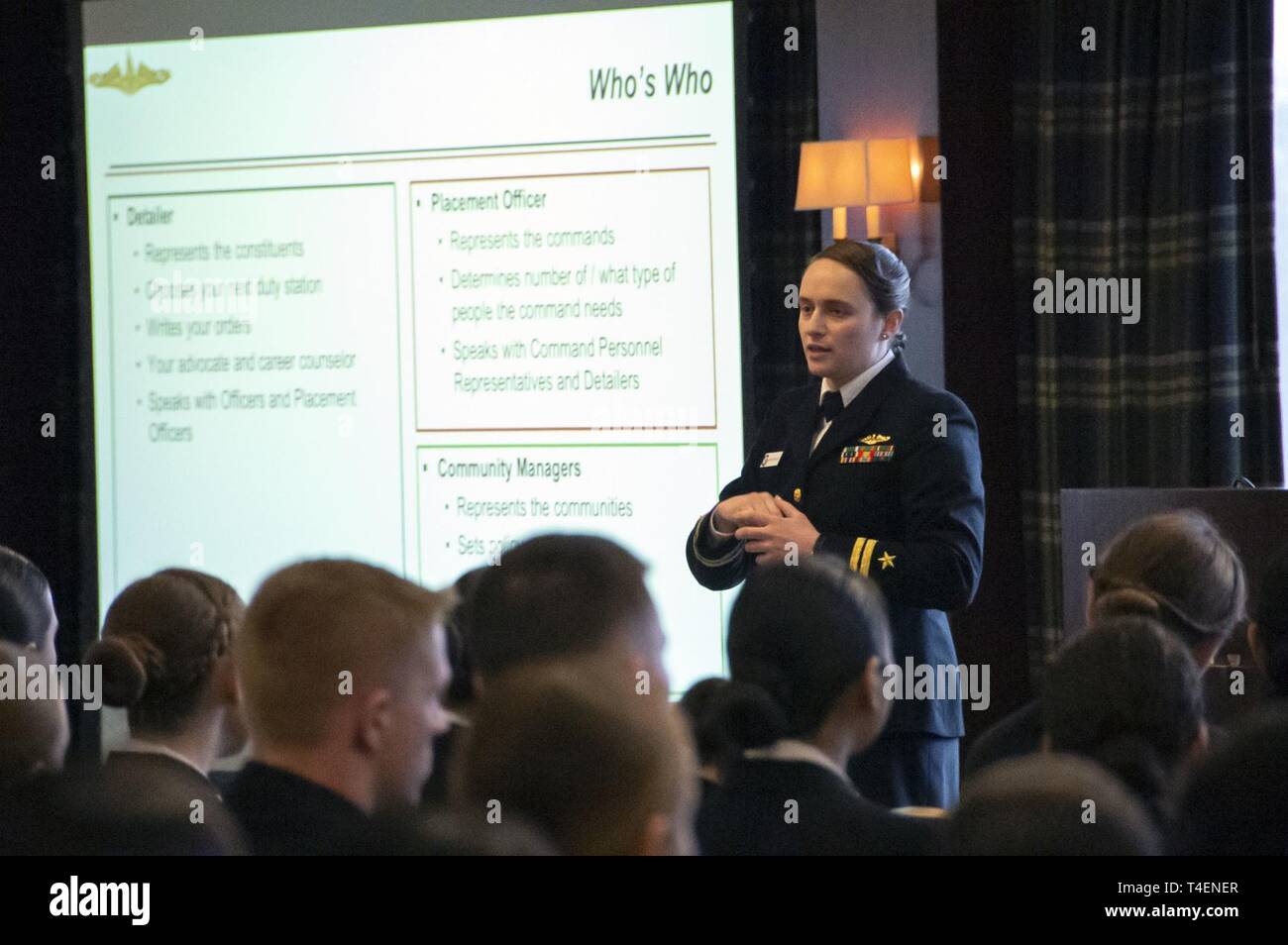 ANN ARBOR, Mi. (March 30, 2019) – Lt. Jeanne Van Gilder provides a brief on the Bureau of Personnel to midshipmen during the Women in Naval Service symposium hosted by the University of Michigan Naval Reserve Officers Training Corps unit at the Graduate hotel in Ann Arbor. This event was held in conjunction with the U.S. Navy's observation of Women's History Month and provided over 150 midshipmen from units across the country with the opportunity to interact and learn from female leaders serving across the fleet. Stock Photo