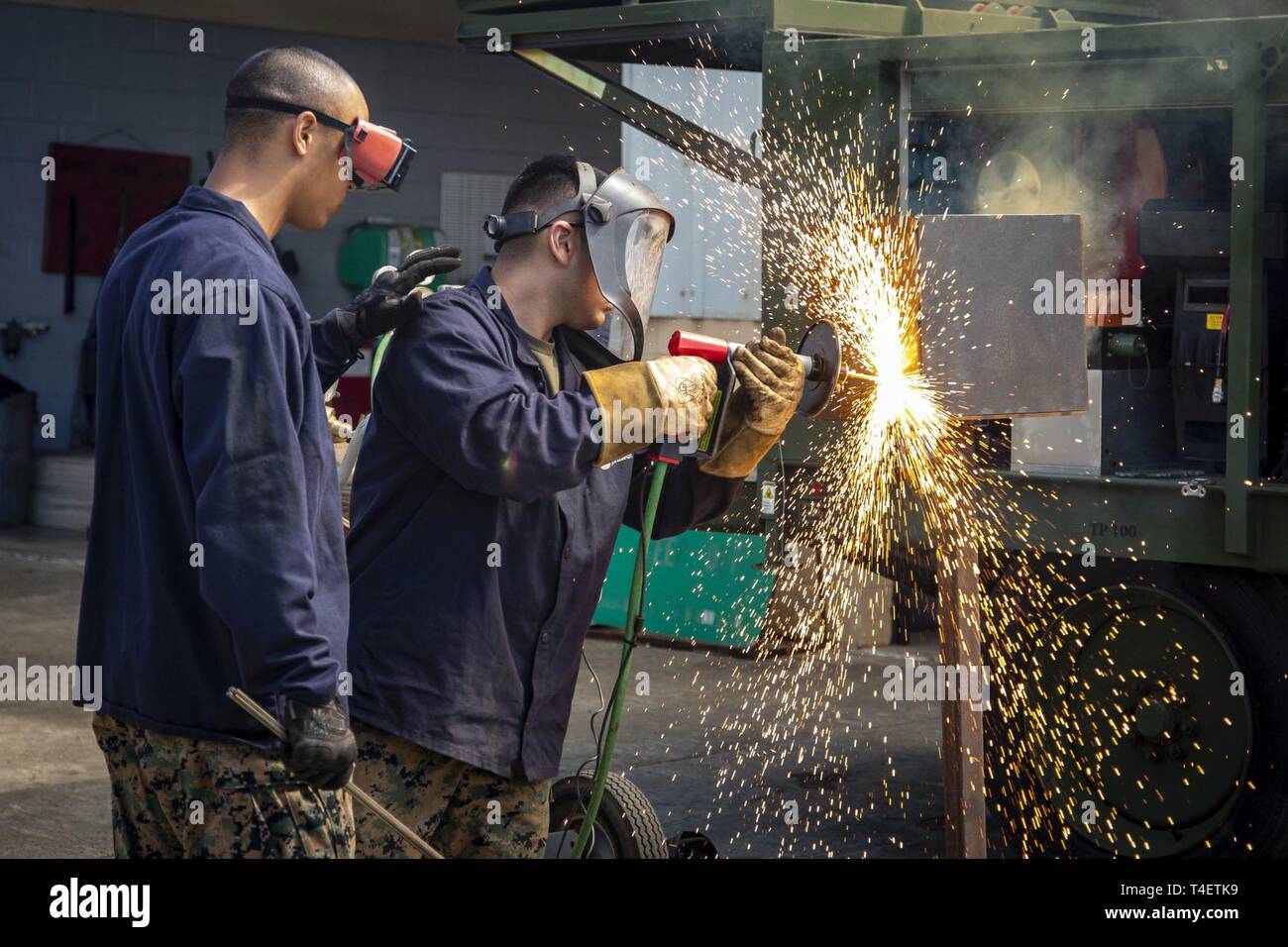 U.S. Marine Corps welders with Combat Logistics Battalion (CLB) 3 ...