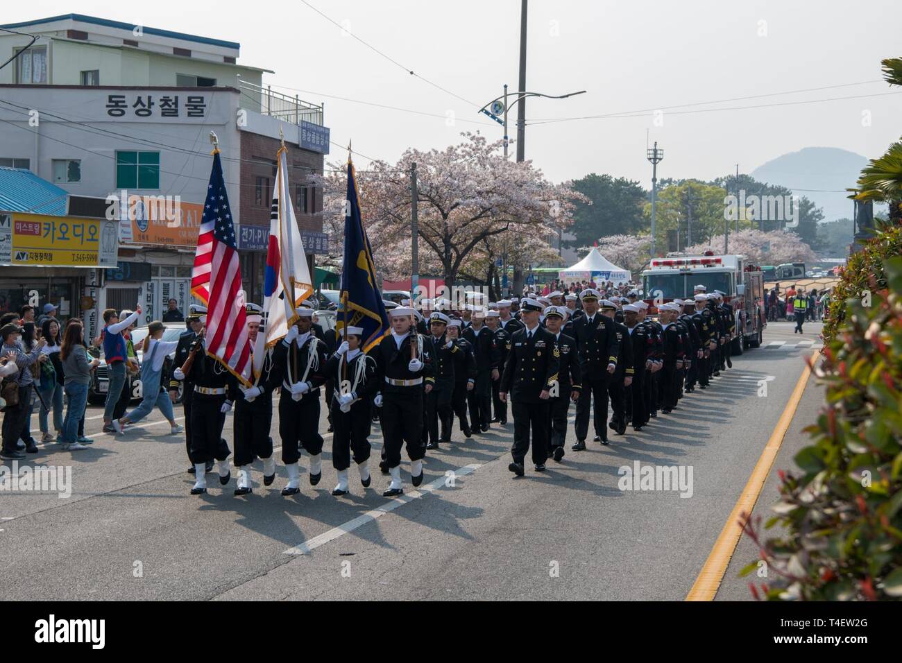 CHINHAE, Republic of Korea (April 05, 2019) Sailors assigned to Commander, Fleet Activities Chinhae (CFAC) march in the 57th annual Jinhae Gunhangje military port festival parade. The festival honors Admiral Yi Sun-sin, a great naval hero of Korea, whose victories still inform the fighting spirit of the ROK Navy. Stock Photo