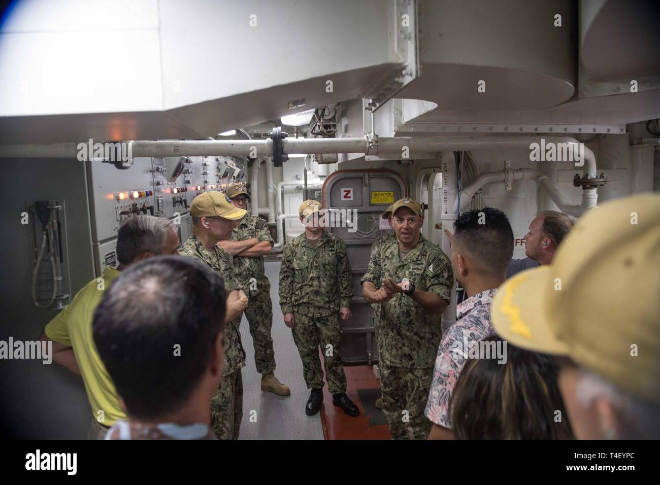 PEARL HARBOR, Hawaii (Apr. 5, 2019) Capt. Carl Andrew Carlson, commanding officer of guided-missile destroyer USS Zumwalt (DDG 1000), speaks during a tour of the ship with Rear Adm. William C. Greene, director, fleet maintenance, U.S. Pacific Fleet. Zumwalt is conducting the port visit as part of its routine operations in the eastern Pacific. Zumwalt-class destroyers provide the Navy with agile military advantages at sea and with ground forces ashore. Stock Photo