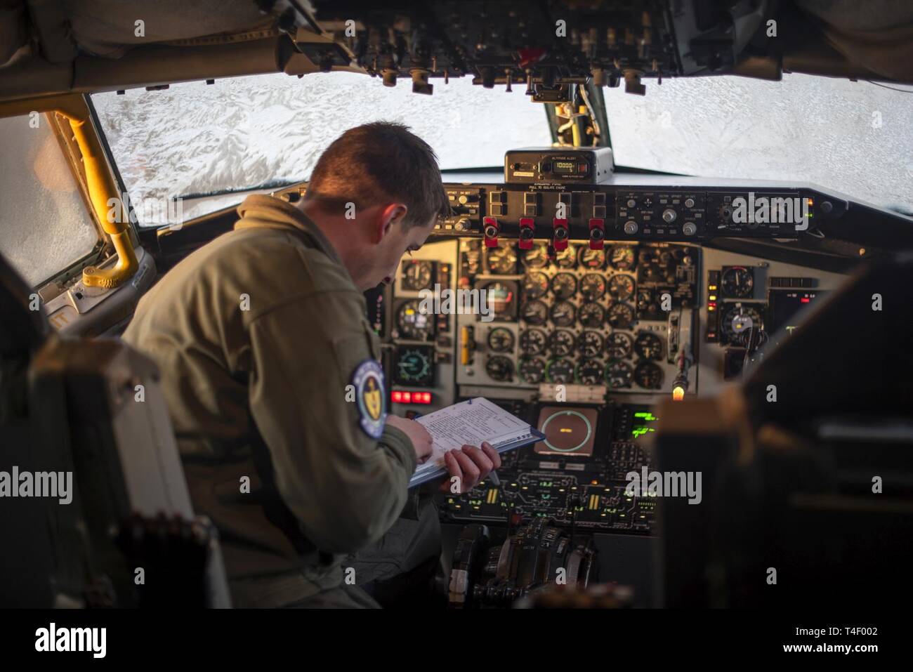 U.S. Air Force Capt. Kevin LeRoux, 351st Air Refueling Squadron pilot, reviews a pre-flight checklist prior to a flight supporting exercise Joint Warrior 19-1 at RAF Mildenhall, England, April 4, 2019. Exercise Joint Warrior is a biannual, U.K.-led multinational exercise and one of largest NATO exercises in Europe, involving 13 countries. Stock Photo