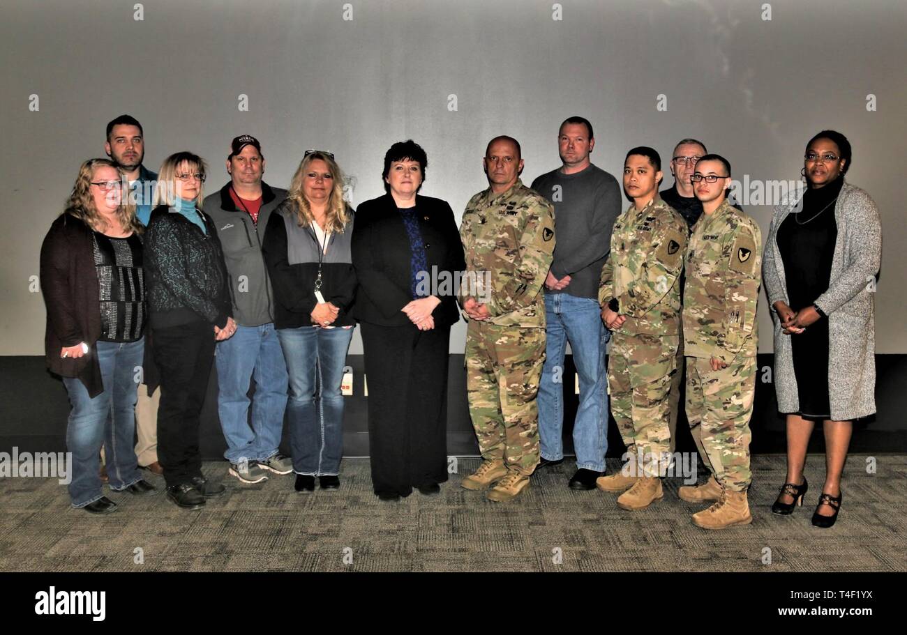 Ten Fort McCoy military and civilian personnel were recognized April 3, 2019, in building 220 at Fort McCoy, Wis., for excellence by the Installation Management Command (IMCOM) Readiness Division Director Brenda Lee McCullough and Command Sgt. Maj. Roy Rocco, IMCOM Readiness Division command sergeant major. Pictured are (from left): Brenda Downing, housing management assistant with the Directorate of Public Works (DPW) Housing Division; Zachery Hynes, DPW housing manager; Susan Bussert, DPW management assistant; Tom Brennen, DPW work order assistant; Tammy Erickson, DPW work order assistant;   Stock Photo