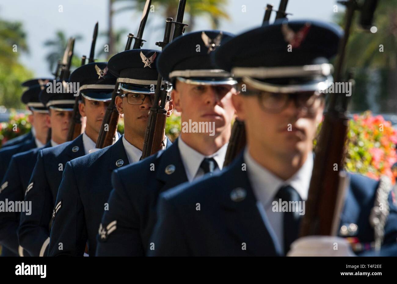 Airmen from the Hickam Field Honor Guard prepare for the arrival of a delegation from the Mongolian Air Force Command at Headquarters Pacific Air Forces, Joint Base Pearl Harbor-Hickam, Hawaii, March 26, 2019. Airmen from the MAFC visited PACAF as part of Airman-to-Airman talks. The multi-day event marked the first A2A talks between the United States and MAFC, a newly separated branch of the Mongolian Armed Forces. Stock Photo