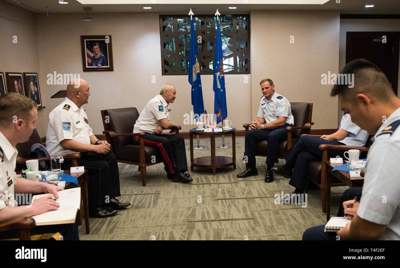 Mongolian Air Force Command Commander Brig. Gen. Enkhbayar Ochir and Pacific Air Forces Deputy Commander Maj. Gen. Russ Mack kick off the first Airman-to-Airman talks between to two nations’ air forces with an office call at Headquarters PACAF, Joint Base Pearl Harbor-Hickam, Hawaii, March 26, 2019. A2A talks are jointly held discussions between United States and partner nation air forces designed to bolster relations and provide an opportunity to share best practices from a variety of subject matter areas. Stock Photo