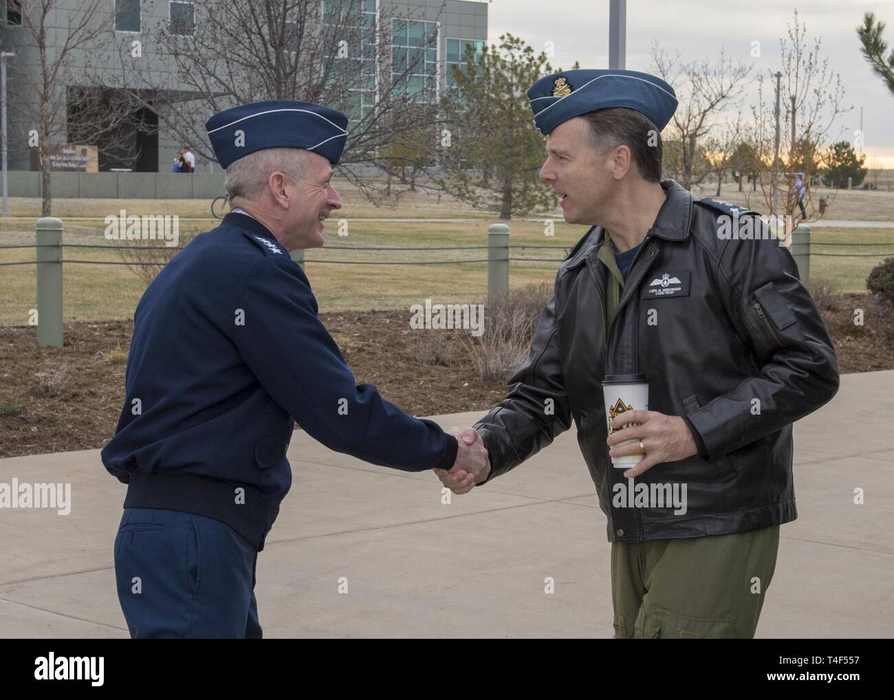 U.S. Air Force Gen. Terrence J. O'Shaughnessy, Commander, North American Aerospace Defense Command and U.S. Northern Command welcomes Royal Canadian Air Force Commander, Lieutenant-General Al Meinzinger to the headquarters in Colorado Springs, Colorado, April 9, 2019. Lieutenant-General Meinzinger's visit is to discuss NORAD modernization efforts and the strong relationship between the RCAF and NORAD. Stock Photo