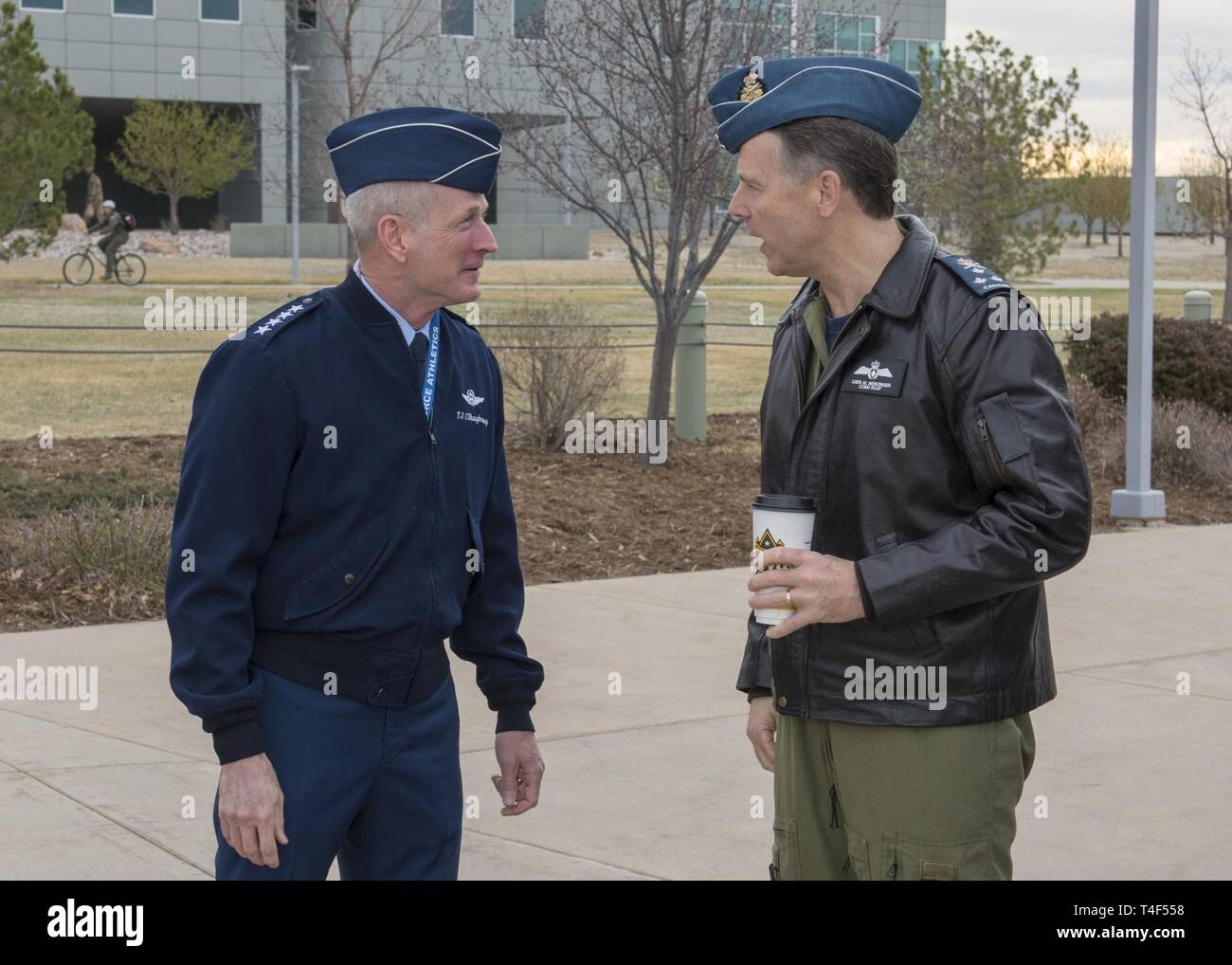 U.S. Air Force Gen. Terrence J. O'Shaughnessy, Commander, North American Aerospace Defense Command and U.S. Northern Command welcomes Royal Canadian Air Force Commander, Lieutenant-General Al Meinzinger to the headquarters in Colorado Springs, Colorado, April 9, 2019. Lieutenant-General Meinzinger's visit is to discuss NORAD modernization efforts and the strong relationship between the RCAF and NORAD. Stock Photo