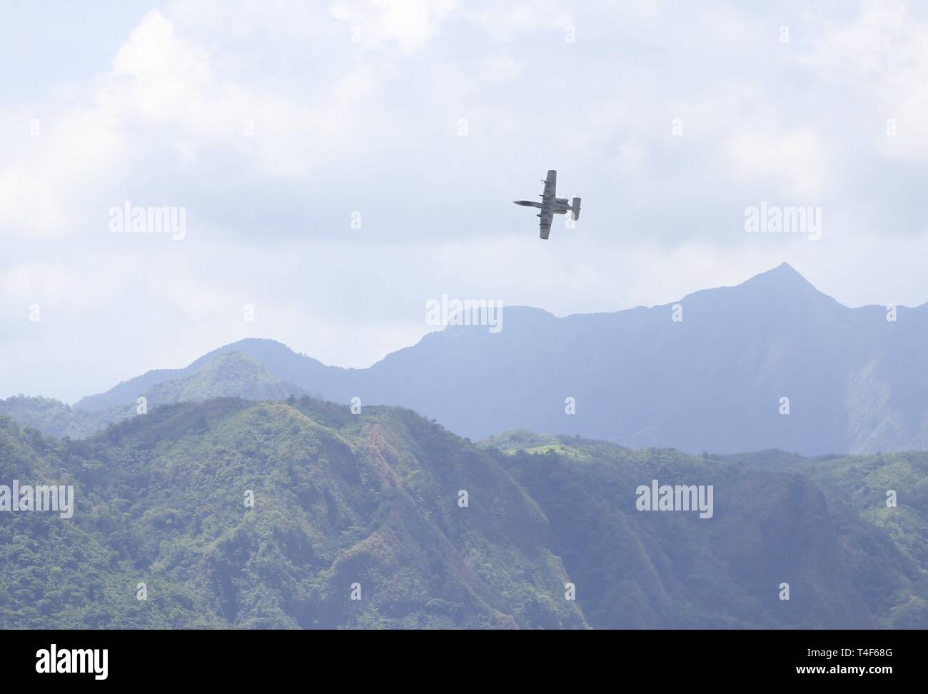 A U.S. Air Force A-10 Thunderbolt II flies over a training range during ...