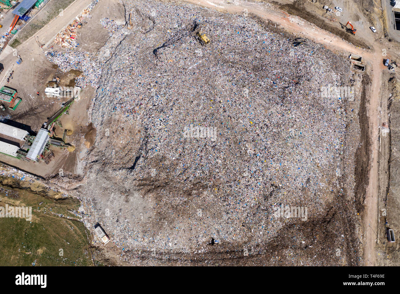 Aerial top drone view of large garbage pile, trash dump, landfill