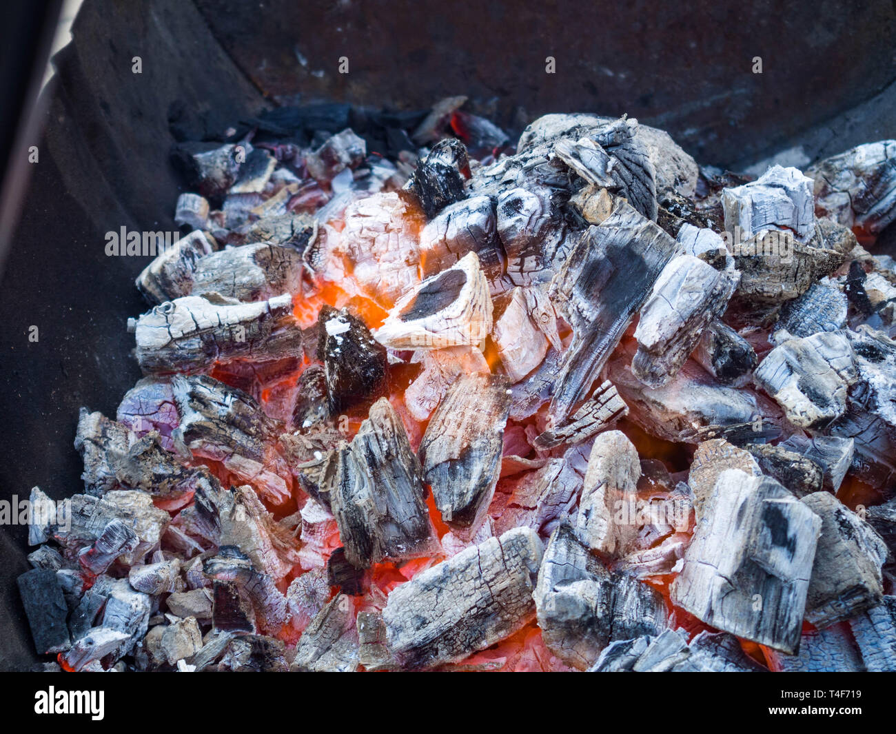 Hot coals Empty flaming charcoal grill with open fire with copyspace. Summer grilling barbecue bbq and party Stock Photo Alamy