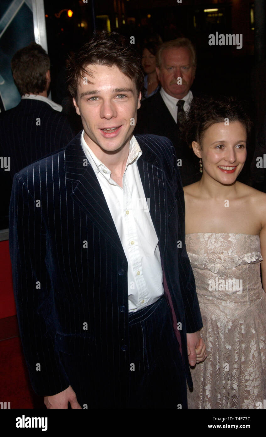 LOS ANGELES, CA. March 30, 2004: Actor RUPERT EVANS & girlfriend actress LYNDSEY MARSHAL at the Los Angeles premiere of his new movie Hellboy. Stock Photo