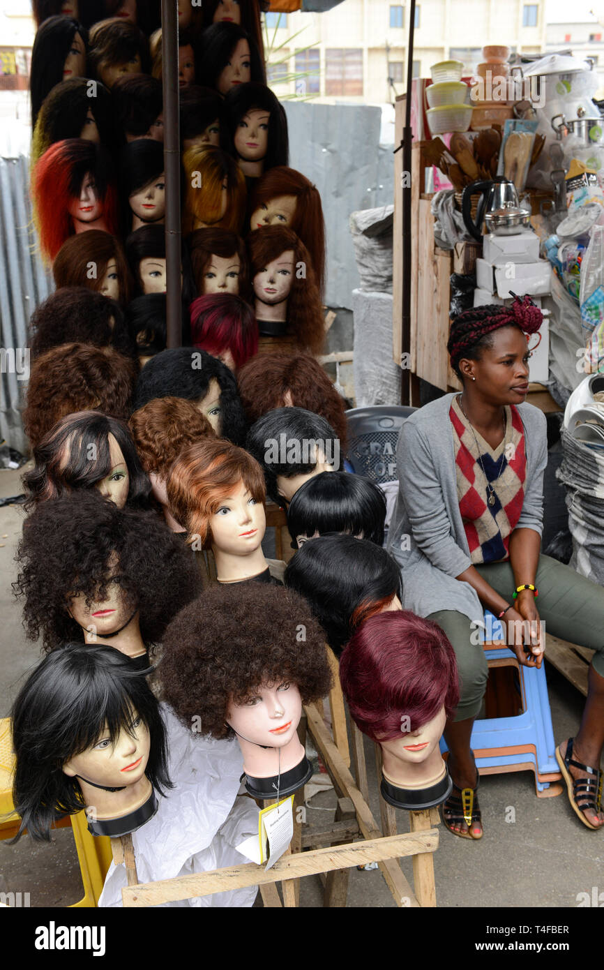 TOGO, Lome, Grande Marche, Grand market, booth with wigs and artificial hair / Grosser Markt, Verkauf von kuenstlichem Haar und Peruecken Stock Photo