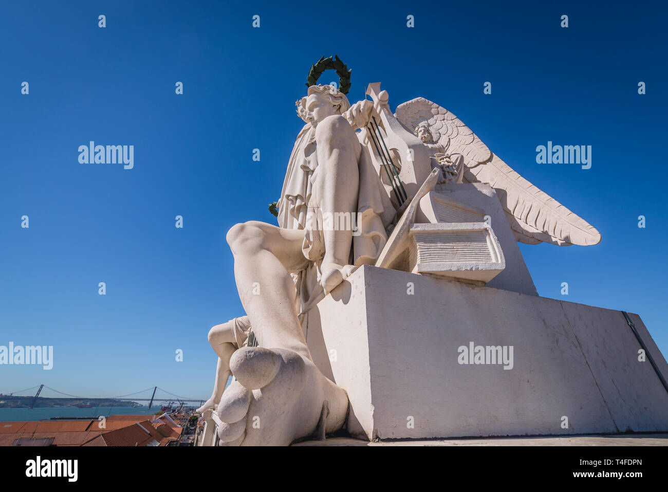 Statue of Glory rewarding Valor and Genius on the top of Rua Augusta Arch at Commerce Square in Lisbon, Portugal Stock Photo