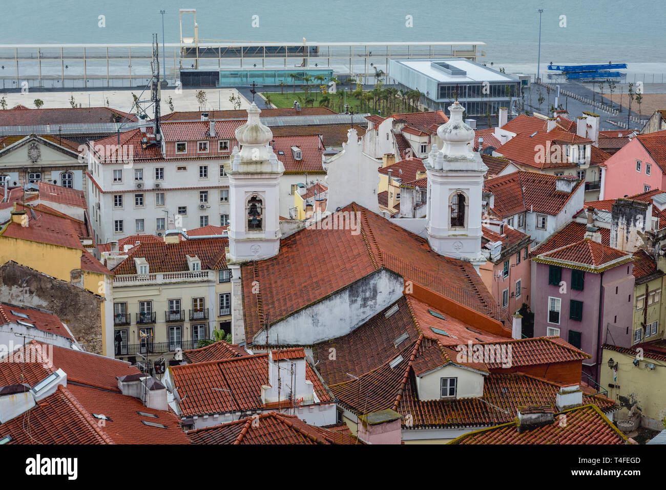 Aerial view with Church of Sao Miguel from Miradouro das Portas do Sol viewing point in Alfama district of Lisbon city, Portugal Stock Photo