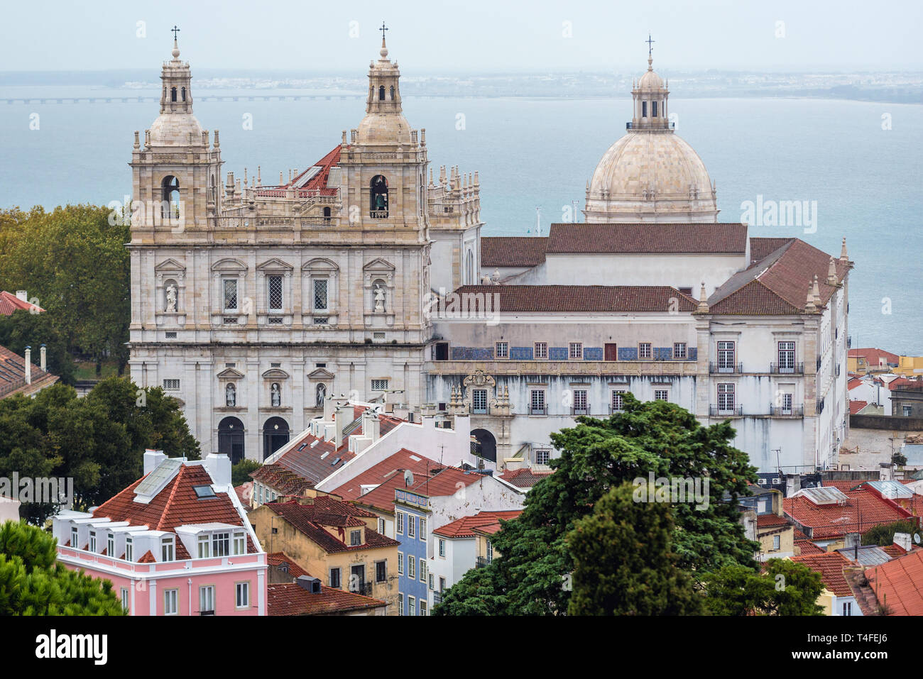 Monastery of Sao Vicente de Fora and dome of National Pantheon seen from Castelo de Sao Jorge citadel in Lisbon, Portugal Stock Photo