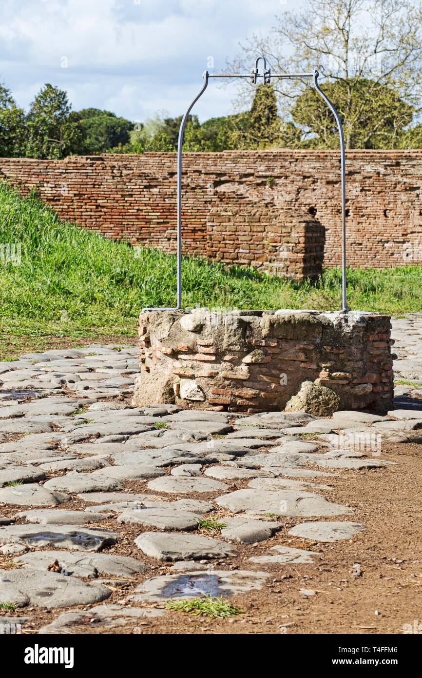 Ancient medieval well in the Roman archaeological excavations of Ostia Antica - Rome, Italy Stock Photo