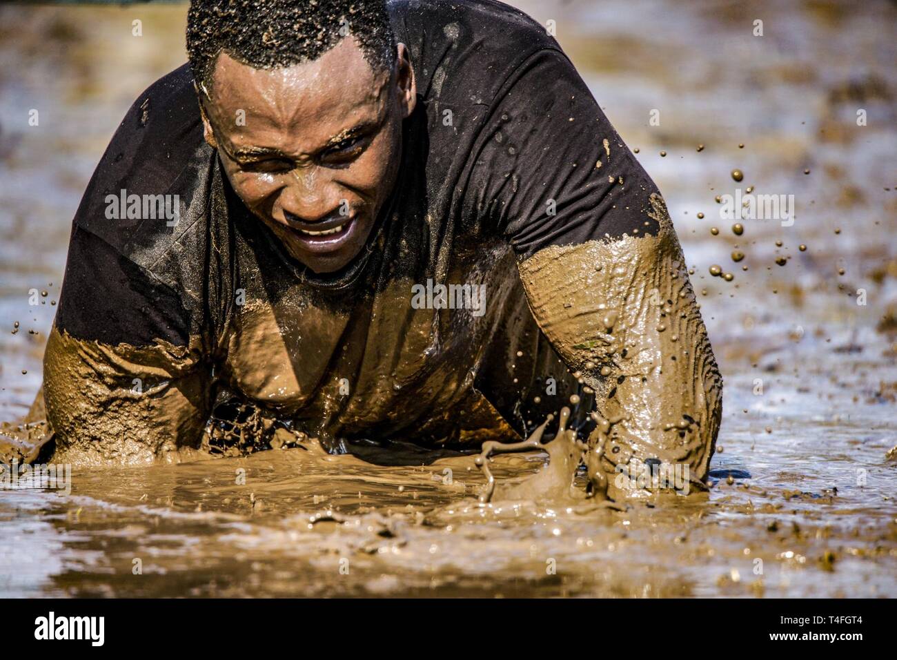 Army crawling through mud hires stock photography and images Alamy