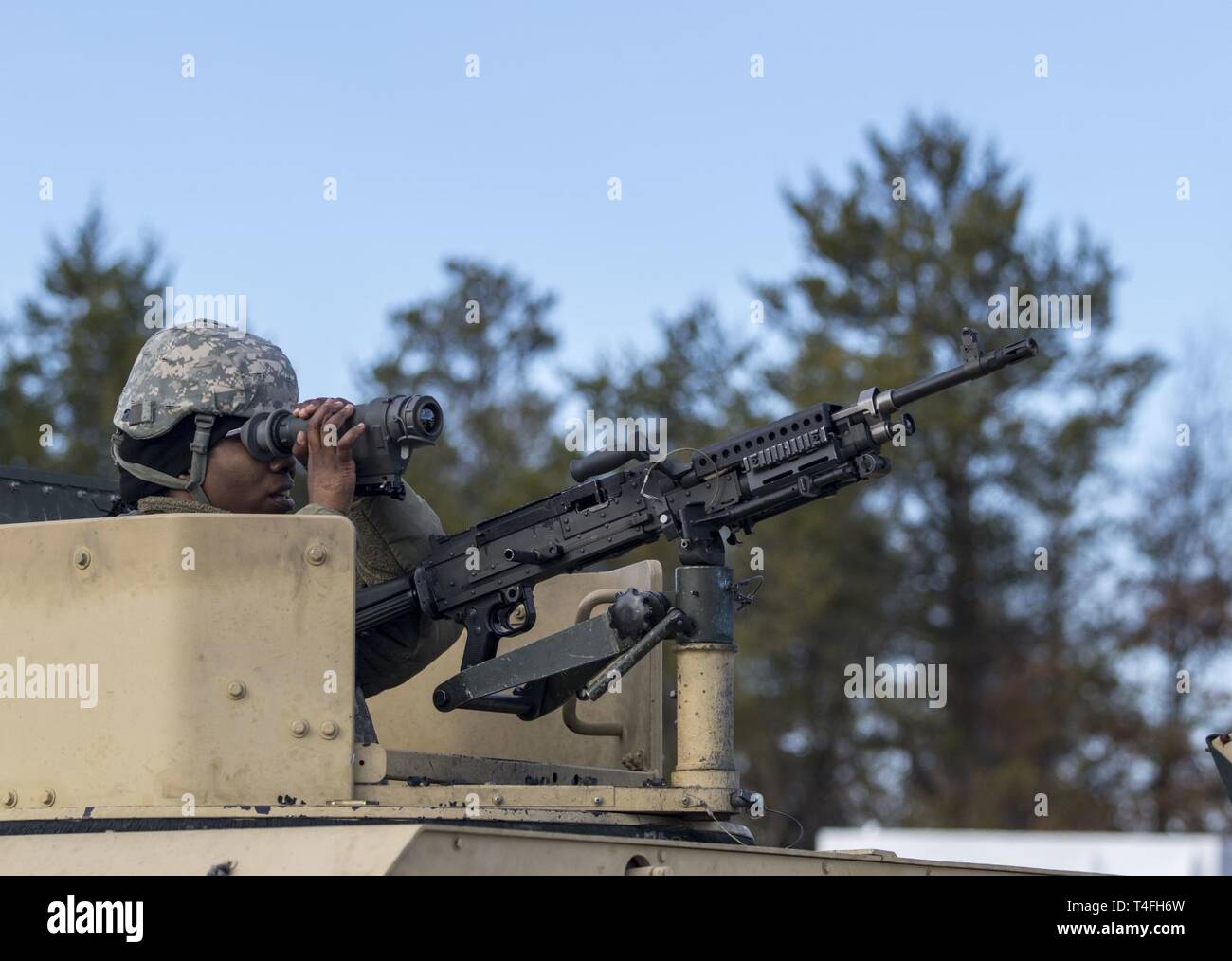 A U.S. Army Reserve Soldier looks through an AN/PAS13 Thermal Weapon Sight during Operation