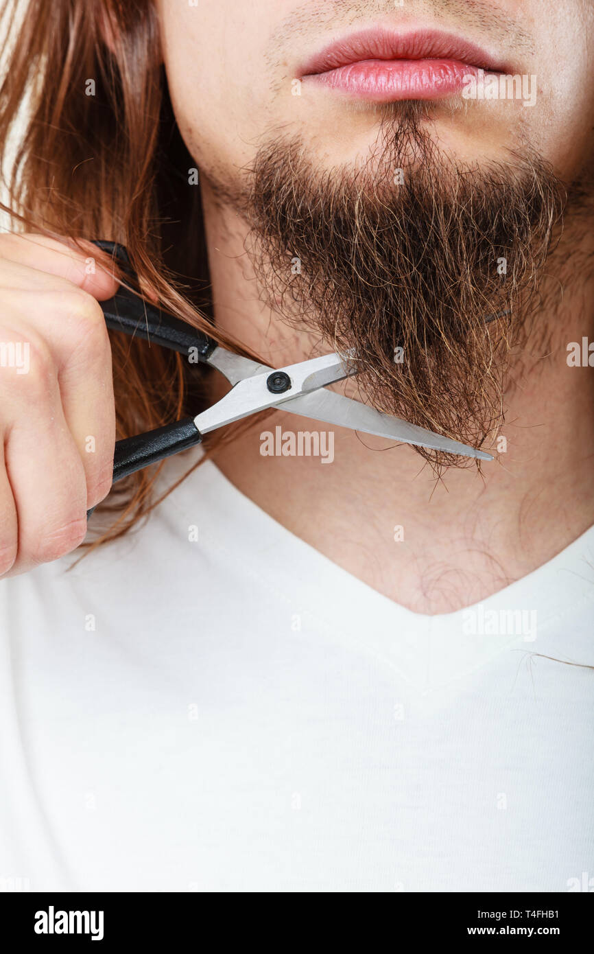 shaving long beard with razor