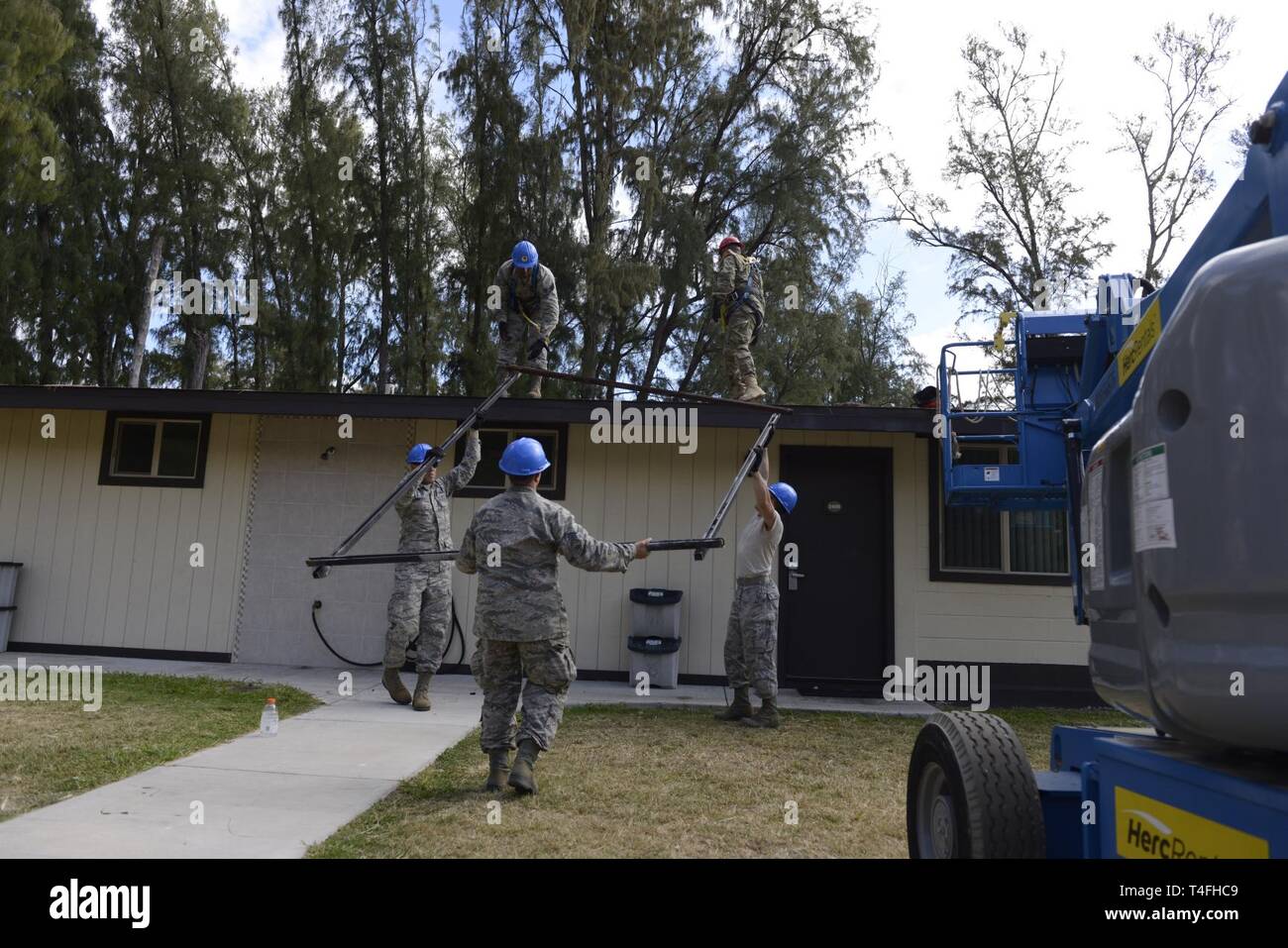 Airmen Of The 103rd Civil Engineer Squadron Remove Solar Panels