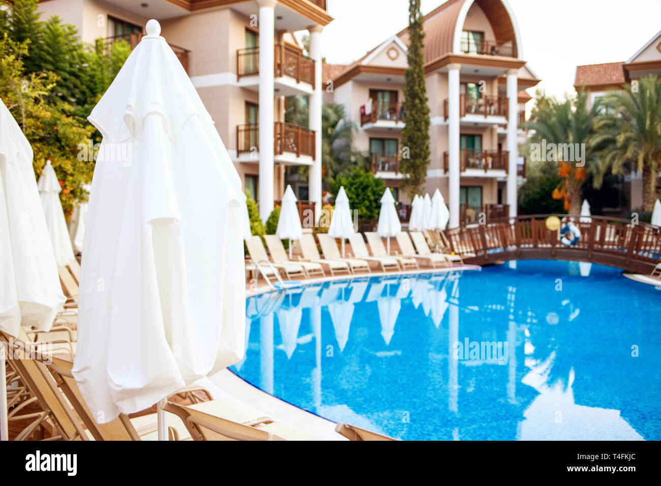 Swimming pool in front of hotel. Stock Photo