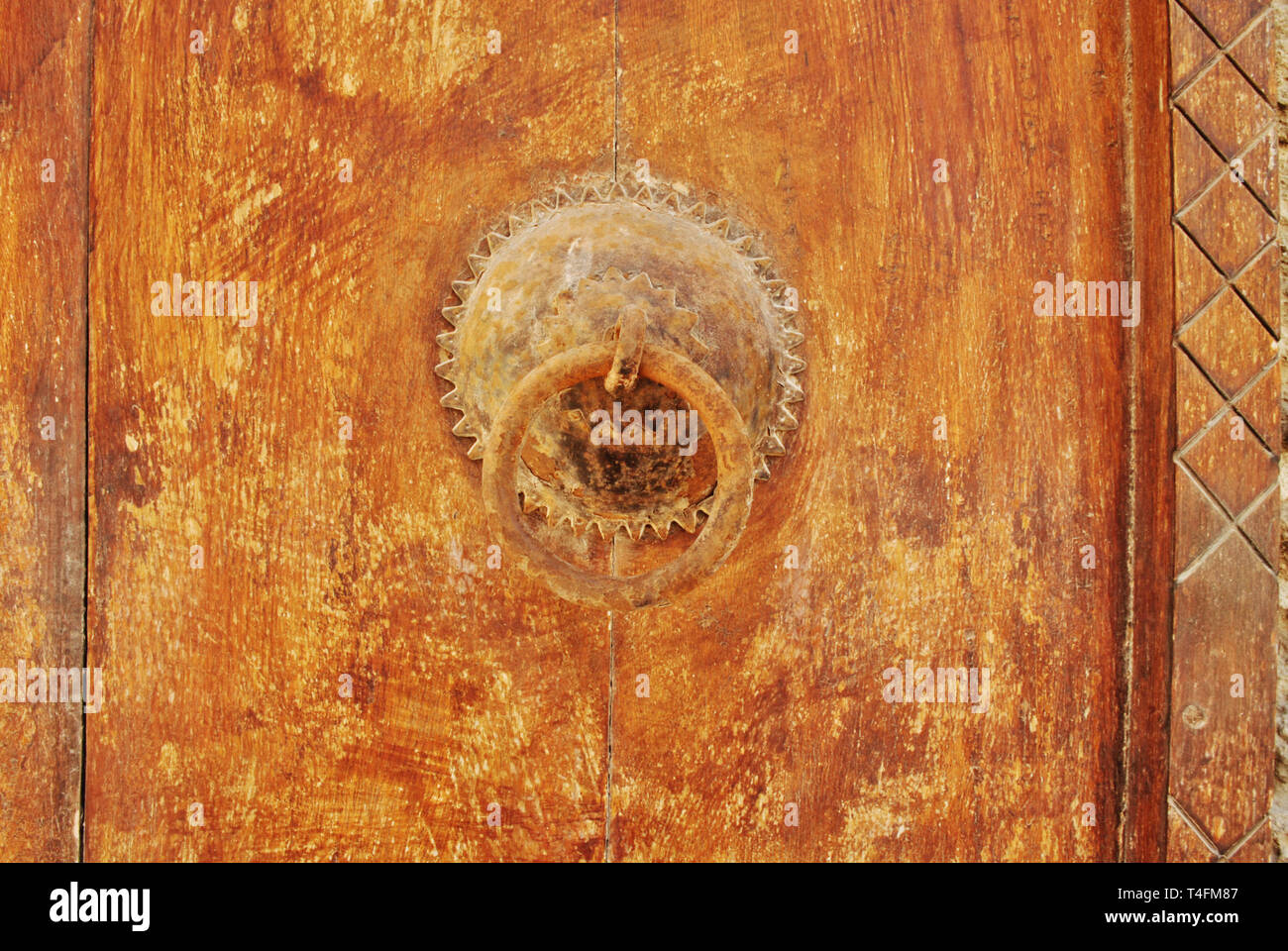 Ancient door latch at Bahrain fort Stock Photo