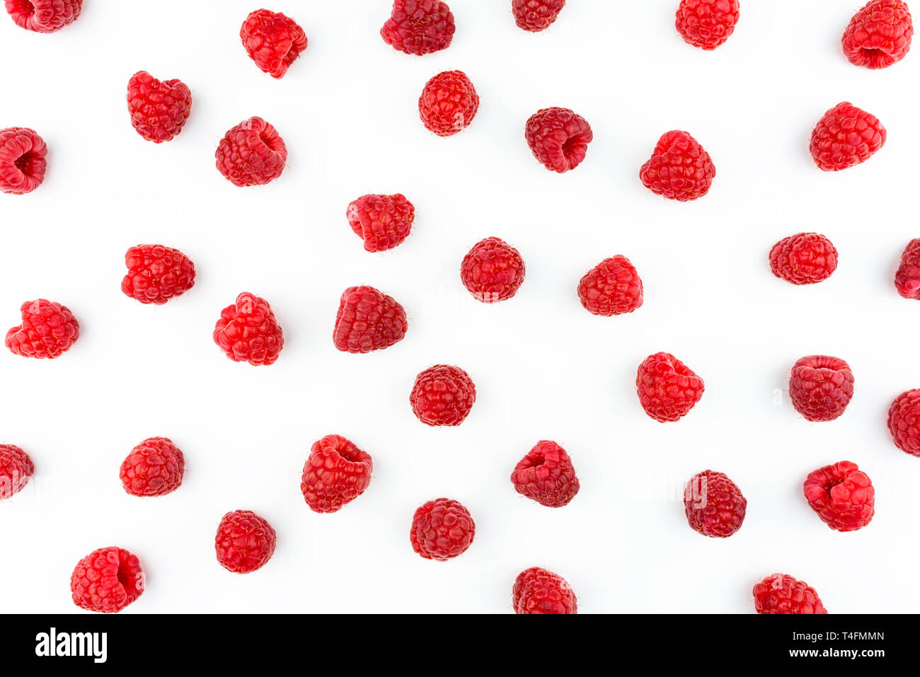 Pattern made from fresh raspberries, top view, flat lay pattern, isolated on a white background. Stock Photo