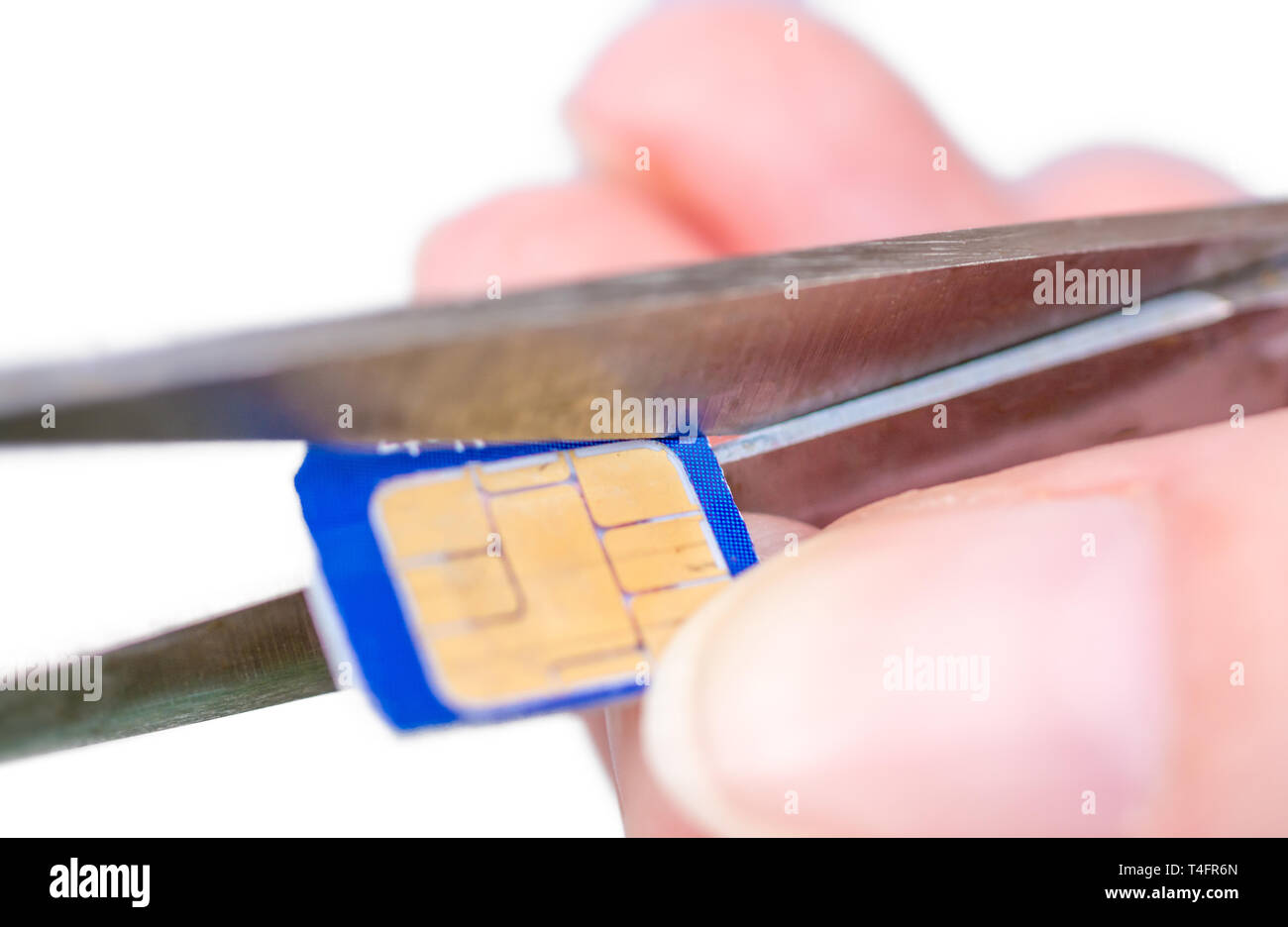 Micro SIM card is tailored to a nano SIM Stock Photo