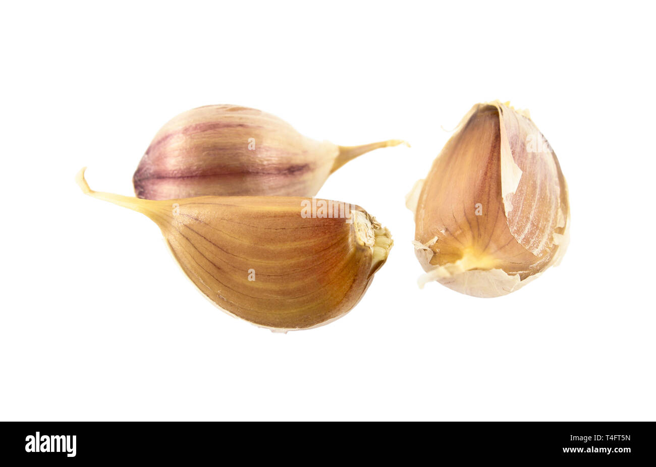 A few cloves of garlic isolated on white Stock Photo