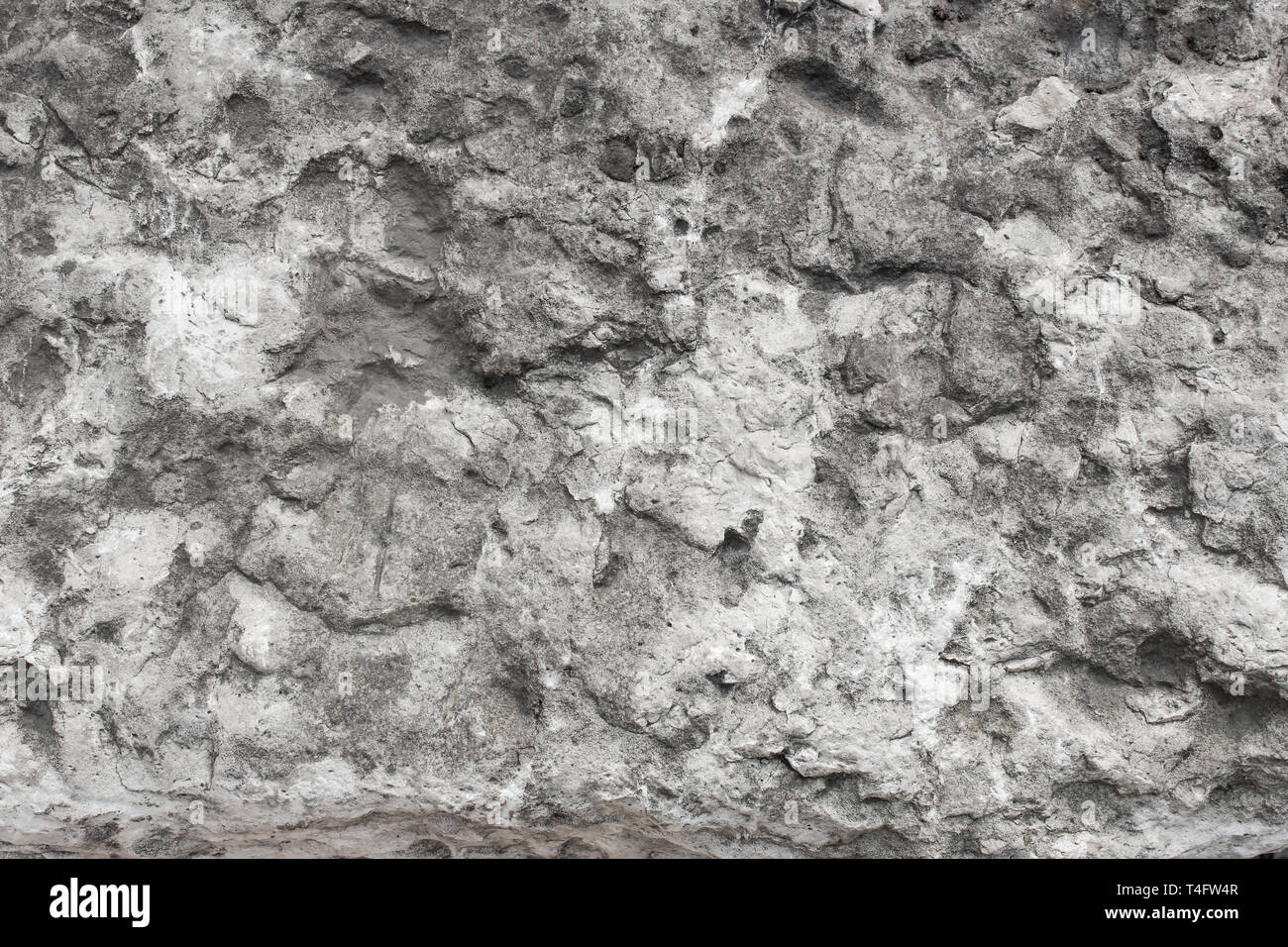 The texture of a flat stone limestone rocks in the background Stock