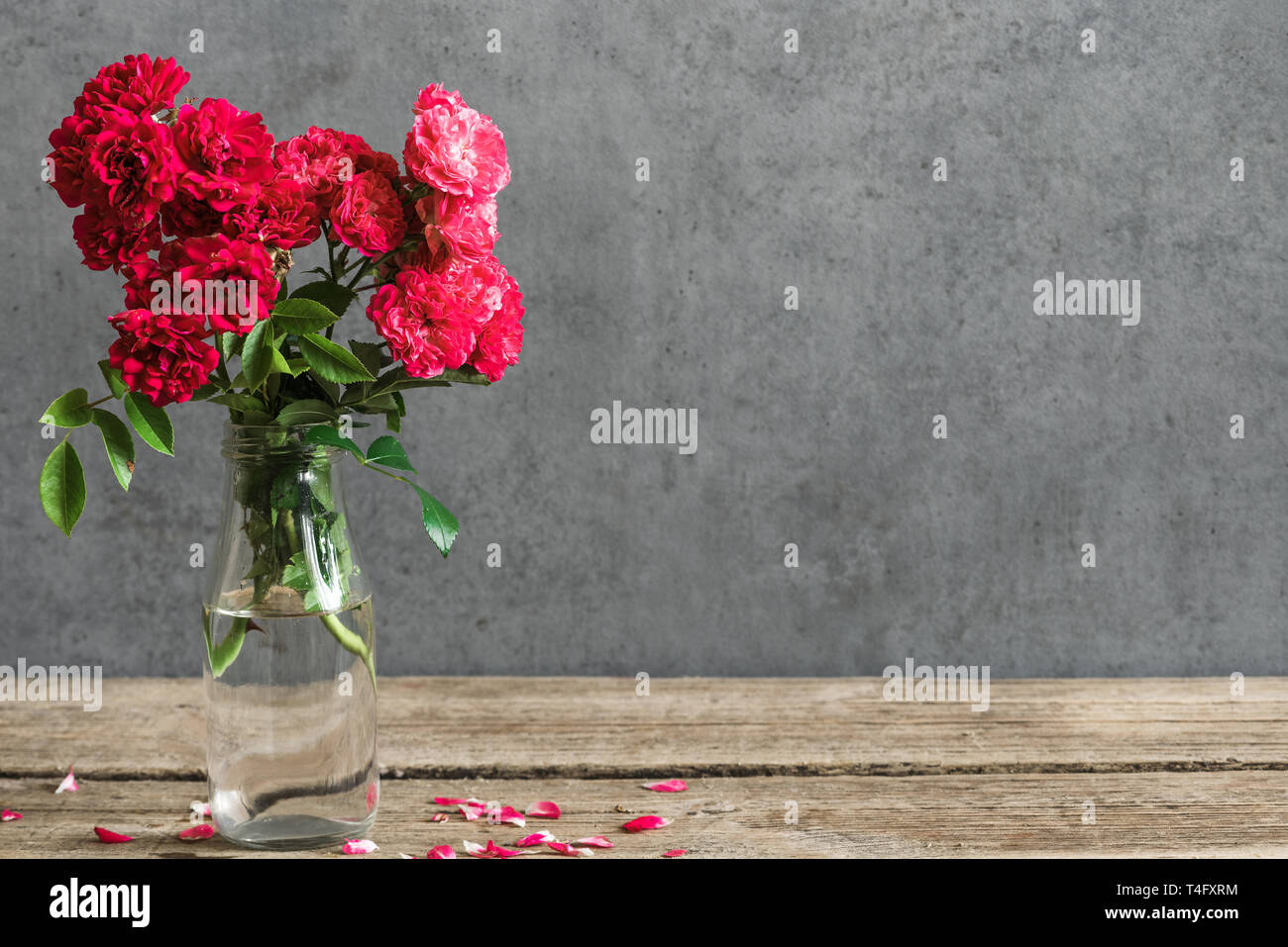Still life with a beautiful bouquet of red roses flowers. holiday or