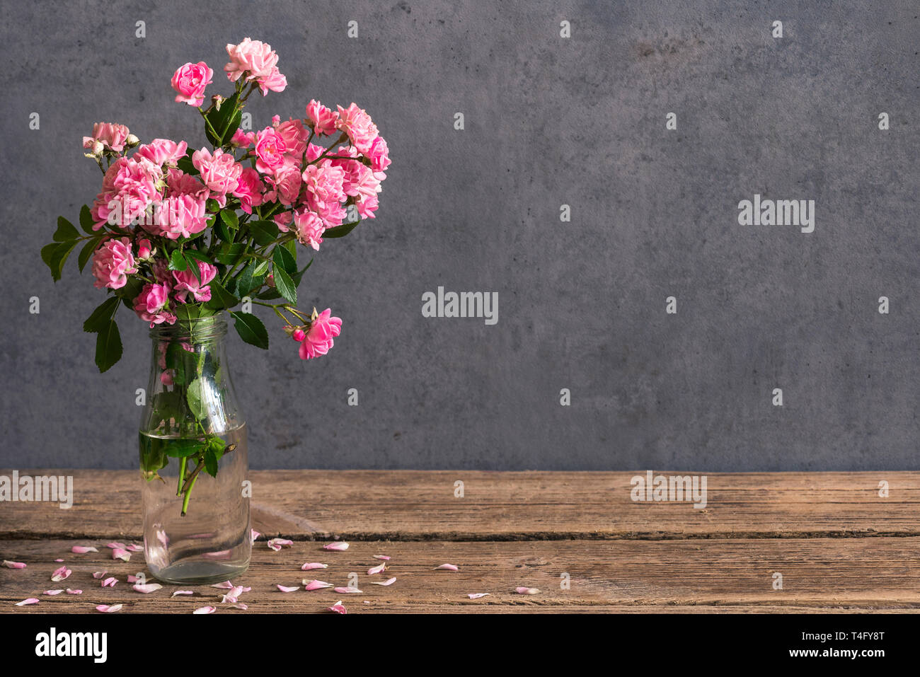 Still life with a beautiful bouquet of pink roses flowers. holiday or