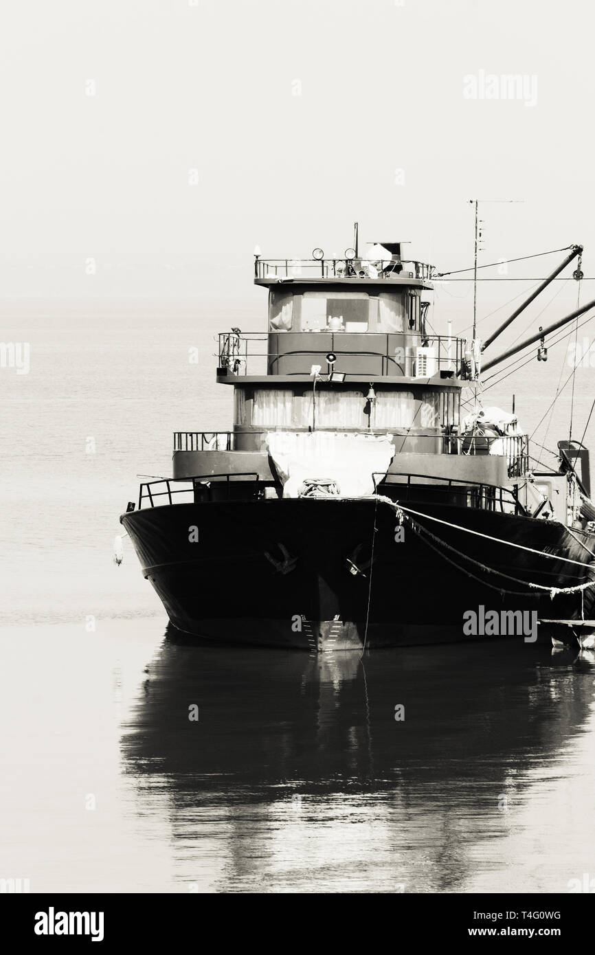 Large fish processing boat in the deep water dock. photo Stock Photo