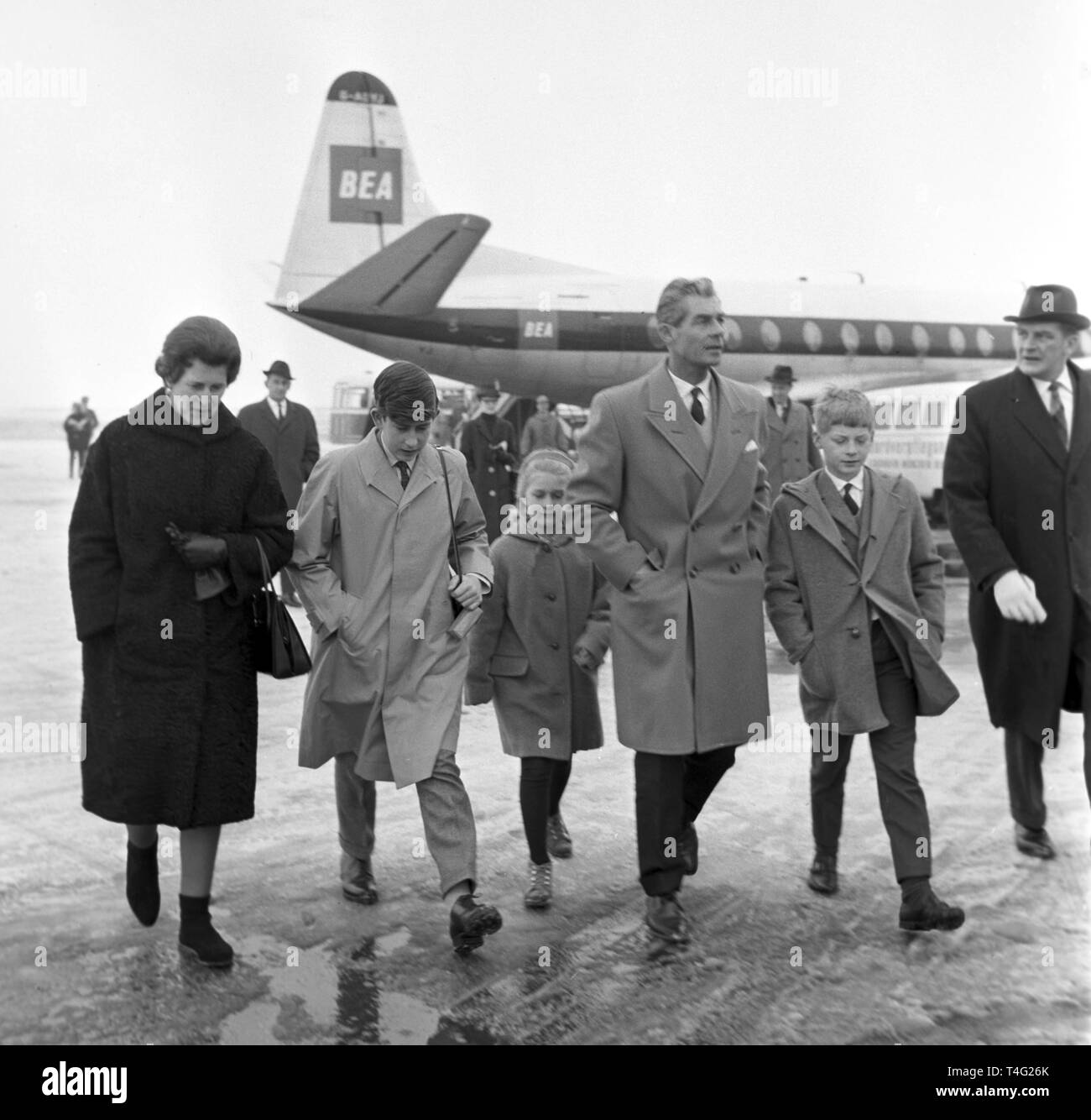 Prince Charles, Queen Elizabeth II.'s son, arrives for his first visit to  Germany at the airport of Munich on the 9th of January in 1963. He will  travel on to Switzerland afterwards.