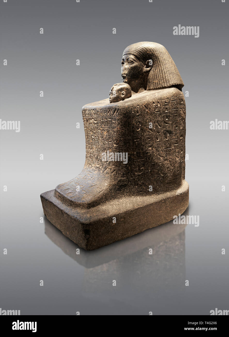 Ancient Egyptian granite block statue of the steward Haruafrom Thebes. 26th Dynasty 500 BC. Neues Museum Berlin AM 8163. Stock Photo